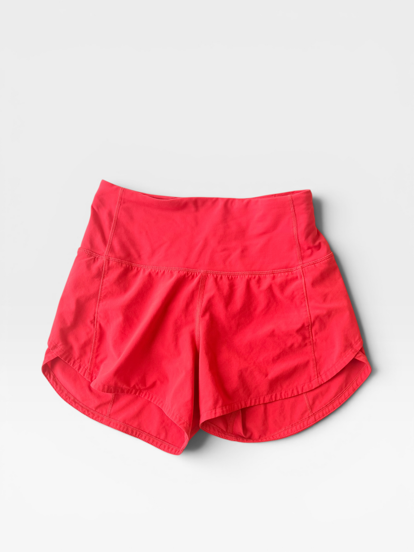CORAL LULULEMON SHORTS 0