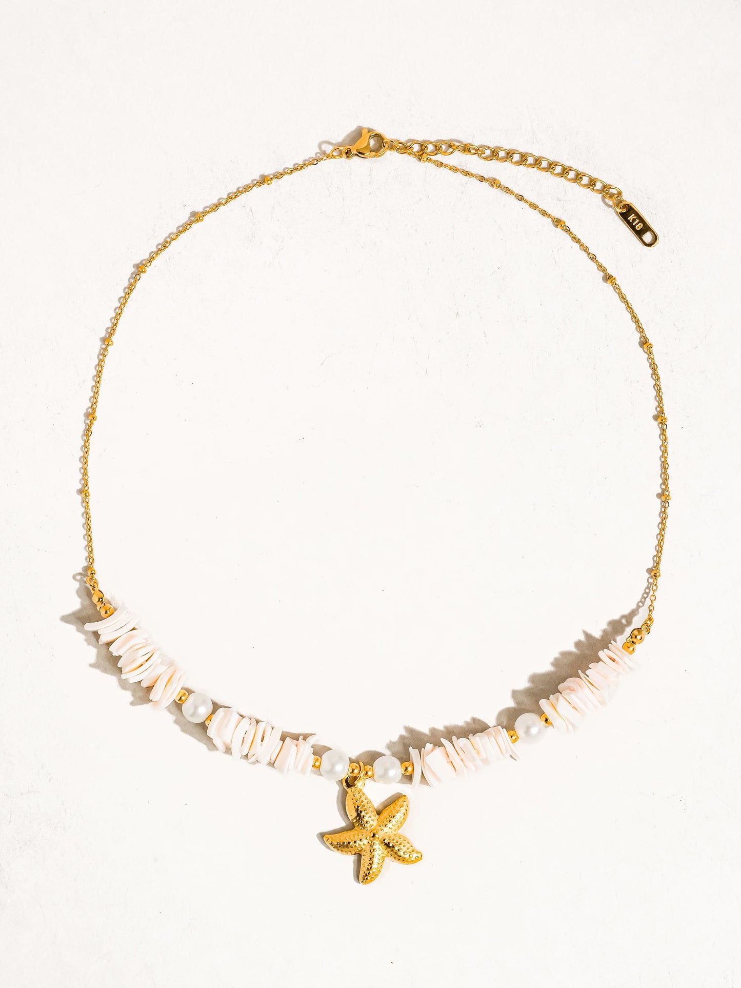 18K GOLD SHELL STAR NECKLACE