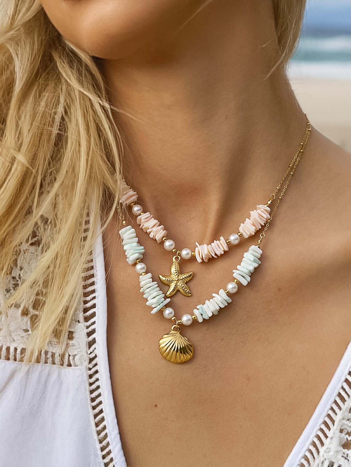 18K GOLD SHELL STAR NECKLACE