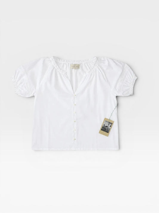 TheConsignmentBar Trovata white Mira blouse with puff sleeves, button-down front, and original tags attached.